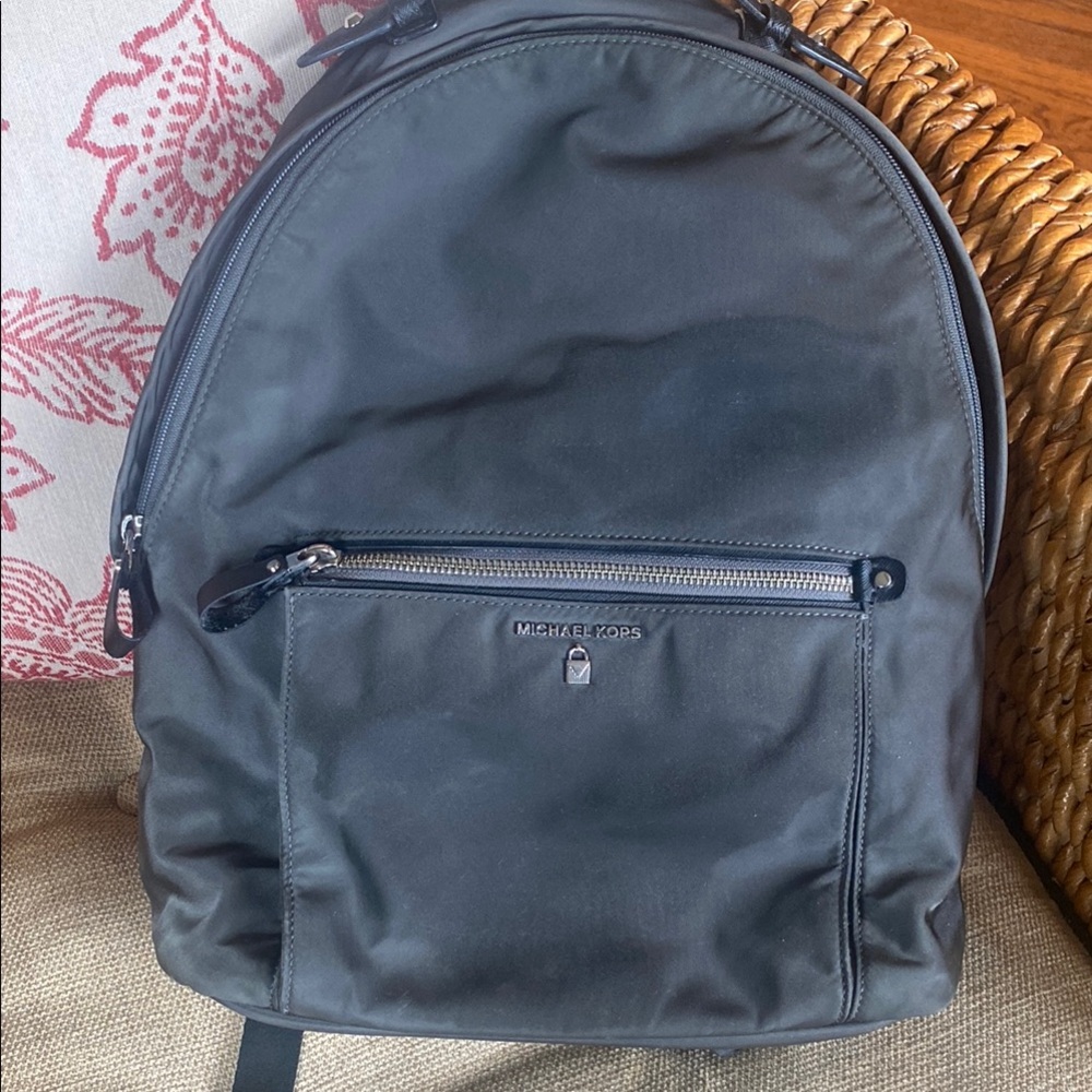MK Handle Attachment Travel Backpack Minimalist Design
